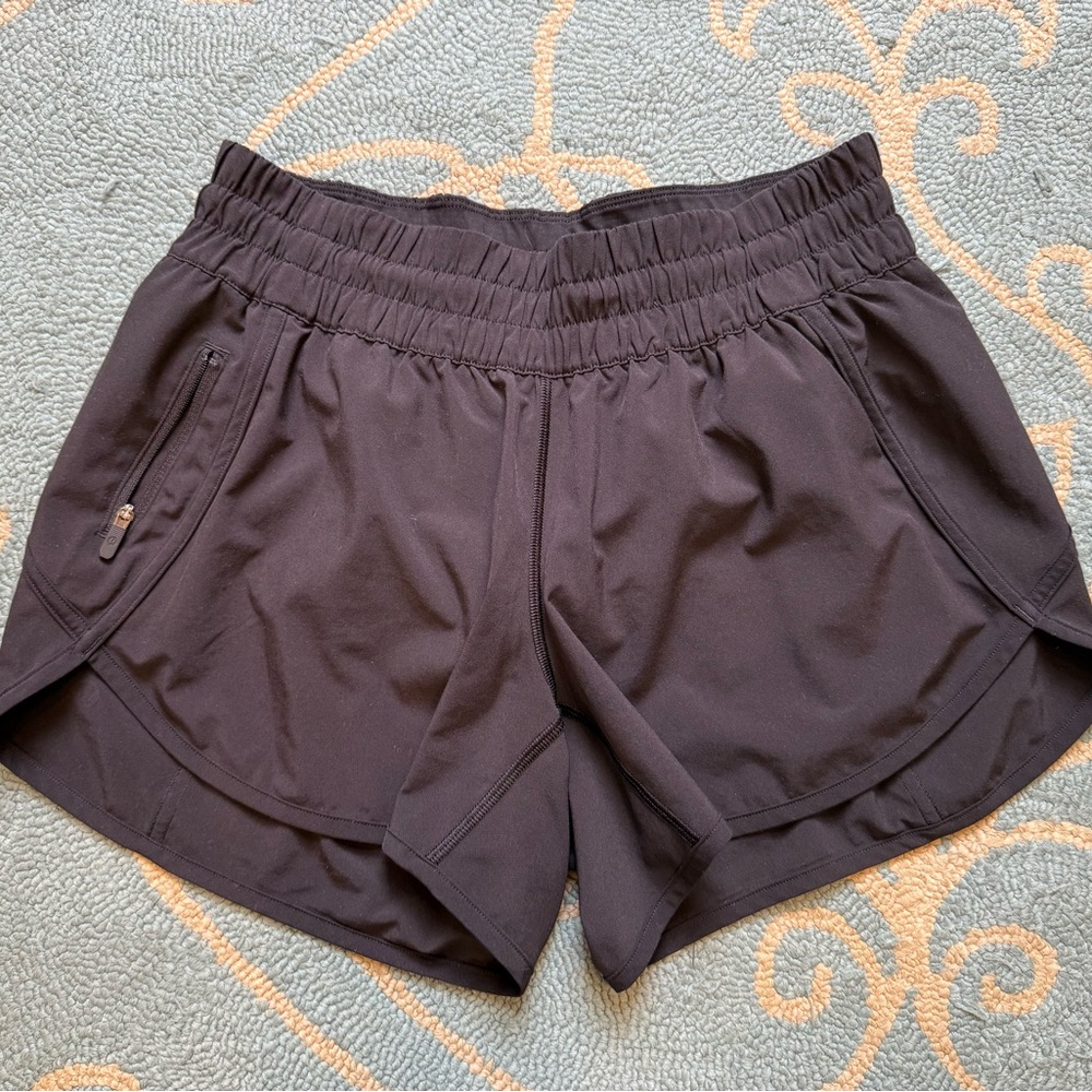 lululemon black Tracker Short V 4” (size 8)